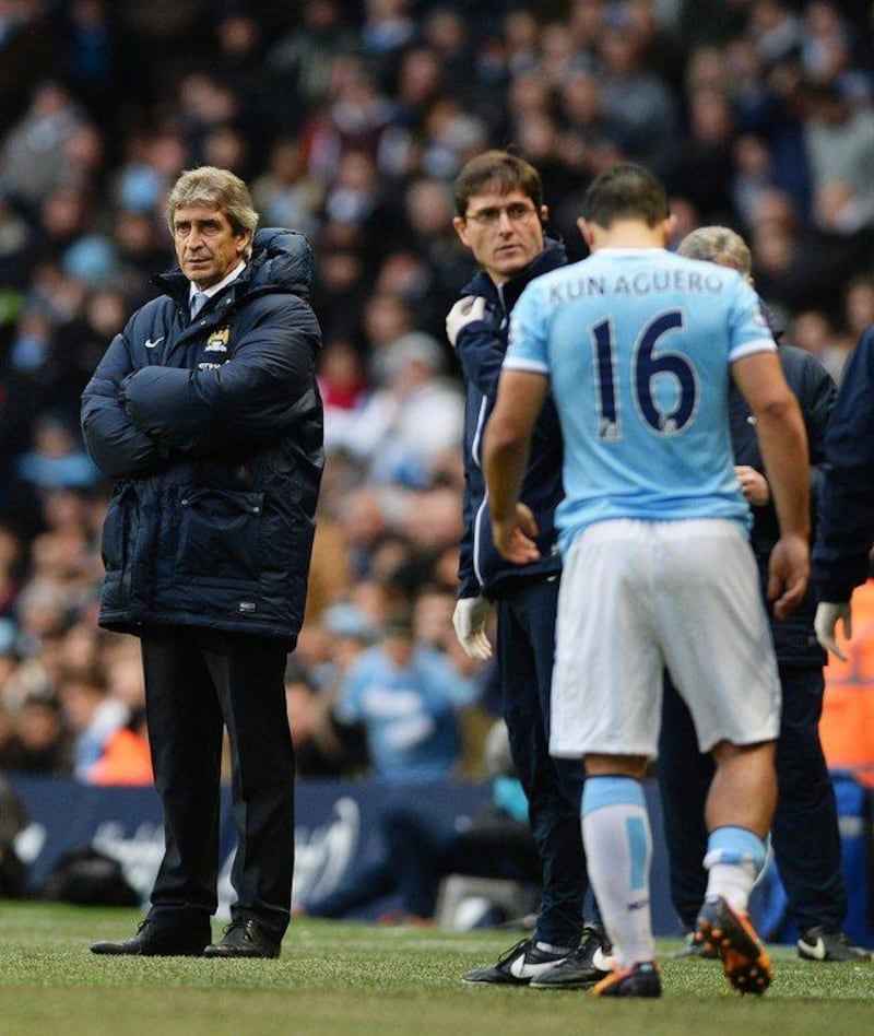 Sergio Aguero came off in the 50th minute of Saturday's victory over Arsenal after hurting his calf. Peter Powell / EPA