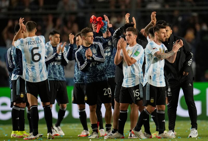 Argentina applaud at the end of their qualifying match against Brazil. AP