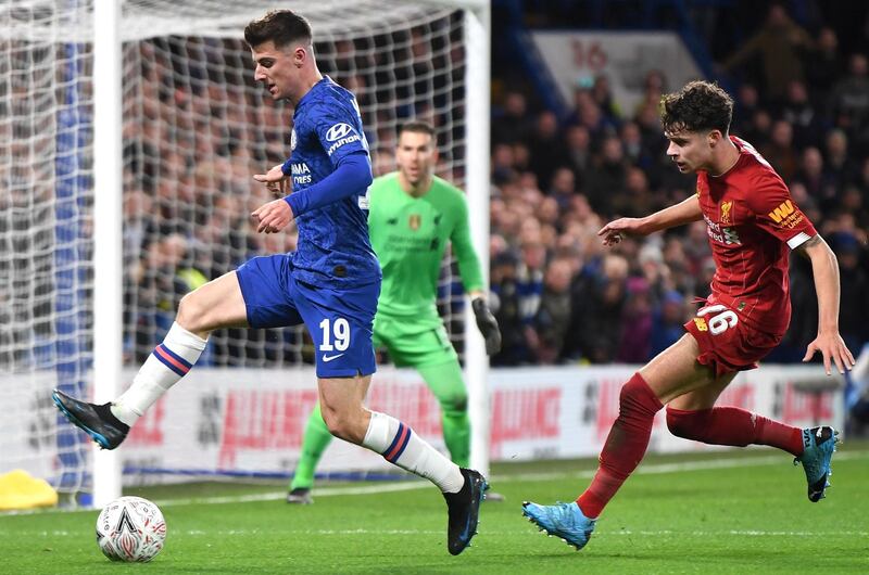 Mason Mount of Chelsea in action against Neco Williams of Liverpool. EPA