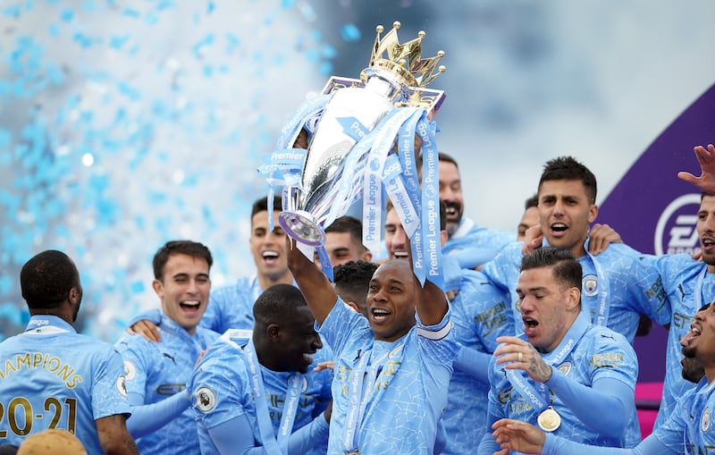Manchester City's Fernandinho with the Premier League trophy in May. PA