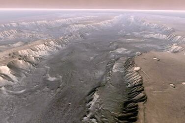 Mars' own Grand Canyon, Valles Marineris, is shown on the surface of the planet in this composite image made aboard NASA's Mars Odyssey spacecraft. Dubai is supporting projects aimed at sustaining life on the planet. Nasa / Arizona State University via Getty Images