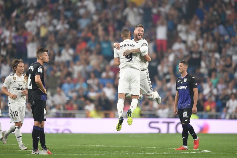 Karim Benzema celebrates with Sergio Ramos after scoring Real Madrid's second goal. Getty Images