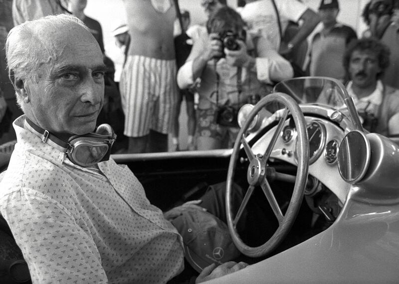 Argentine racing driver Juan Manuel Fangio, five times Formula One world champion, sits in the Mercedes Benz w-196-R, in which he won the Belgium Grand Prix in 1955. Fangio went on to compete in Dubai 1981. Reuters