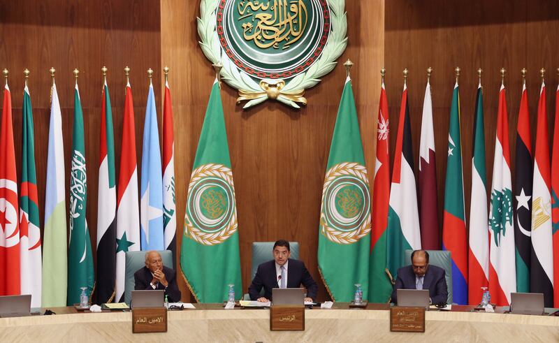 Moroccan Foreign Minister Nasser Bourita, centre, Secretary General of the Arab League Ahmed Aboul Gheit, left, and Assistant Secretary General responsible of the league's council, Ambassador Hossam Zaki, at the Arab League headquarters in Cairo. EPA