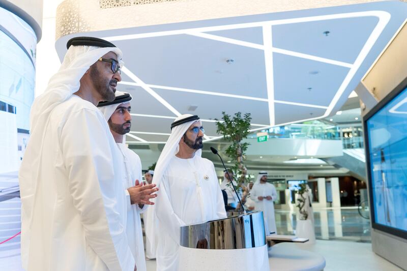 DUBAI, UNITED ARAB EMIRATES -September 17, 2017: HH Sheikh Mohamed bin Zayed Al Nahyan Crown Prince of Abu Dhabi Deputy Supreme Commander of the UAE Armed Forces (L) and HH Sheikh Mohamed bin Rashid Al Maktoum, Vice-President, Prime Minister of the UAE, Ruler of Dubai and Minister of Defence (3rd L), visit Dubai Model for Government Services at Emirates Tower.

( Rashed Al Mansoori / Crown Prince Court - Abu Dhabi )
---