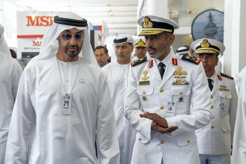 ABU DHABI, UNITED ARAB EMIRATES - February 20, 2019: HH Sheikh Mohamed bin Zayed Al Nahyan, Crown Prince of Abu Dhabi and Deputy Supreme Commander of the UAE Armed Forces (L) tours NAVDEX, at Abu Dhabi National Exhibition Centre (ADNEC). Seen with Rear Admiral Pilot HH Sheikh Saeed bin Hamdan bin Mohamed Al Nahyan, Commander of the UAE Naval Forces (R).
( Ryan Carter for the Ministry of Presidential Affairs )
---
