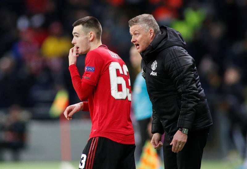 Manchester United manager Ole Gunnar Solskjaer gives instructions to Dylan Levitt. Reuters
