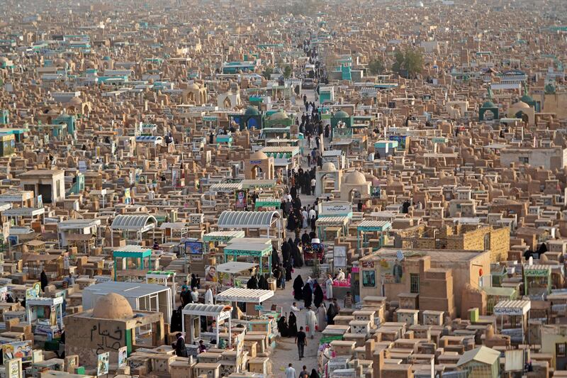 An aerial view of Muslims visiting the graves of their relatives at the Wadi Al Salam (Valley of Peace) cemetery in Iraq's holy city of Najaf. AFP