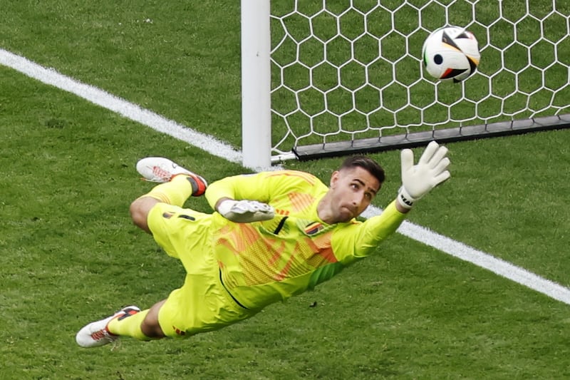 Belgium goalkeeper Koen Casteels makes a save in the first half. EPA