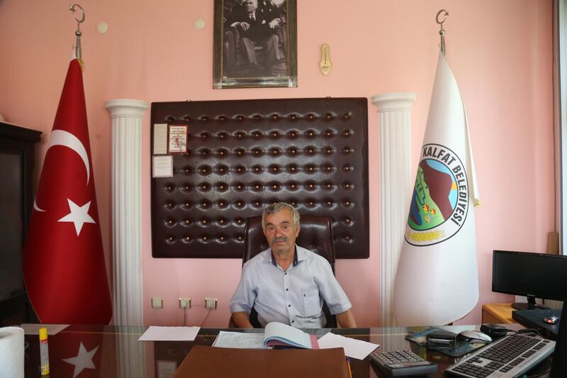Bayram Tavukcu serves as the village leader in Kalfat. EPA Special Commission