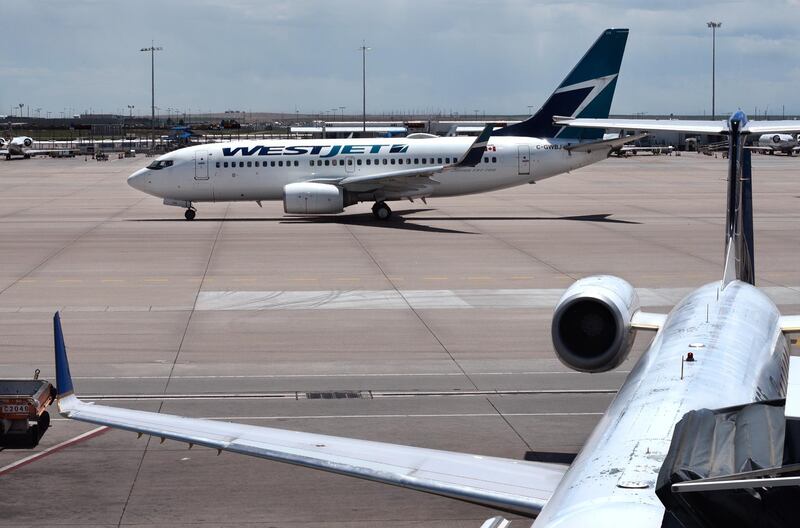 DENVER, COLORADO - JUNE 20, 2019: A Canadian WestJet Airlines Boeing 737 passenger aircraft taxis at Denver International Airport in Denver, Colorado. (Photo by Robert Alexander/Getty Images)