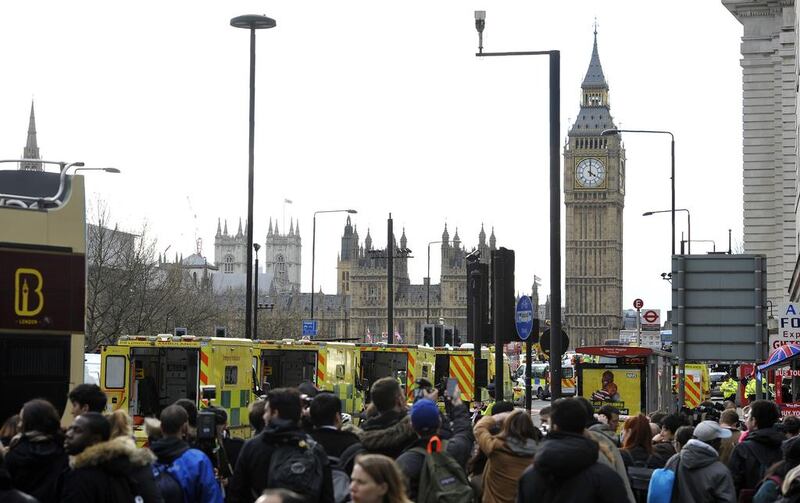 Members of the emergency services work on Westminster Bridge, after a terror attack took place beside the Houses of Parliament in central London. Niklas Halle’n / AFP Photo