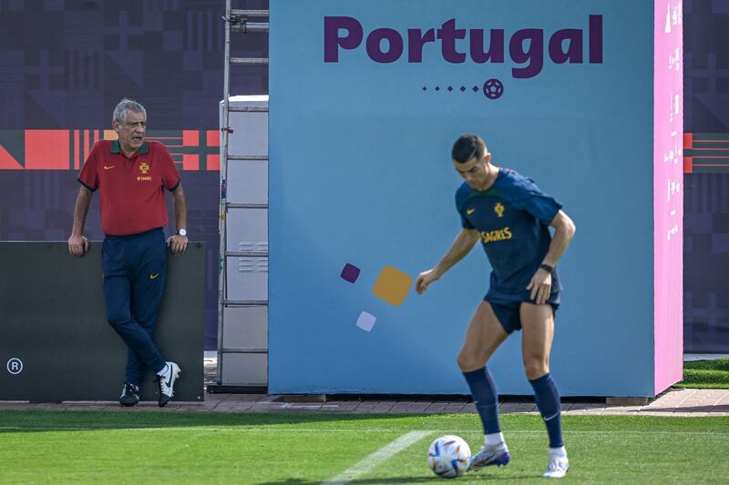 Portugal coach Fernando Santos watches Cristiano Ronaldo during a training session. AFP