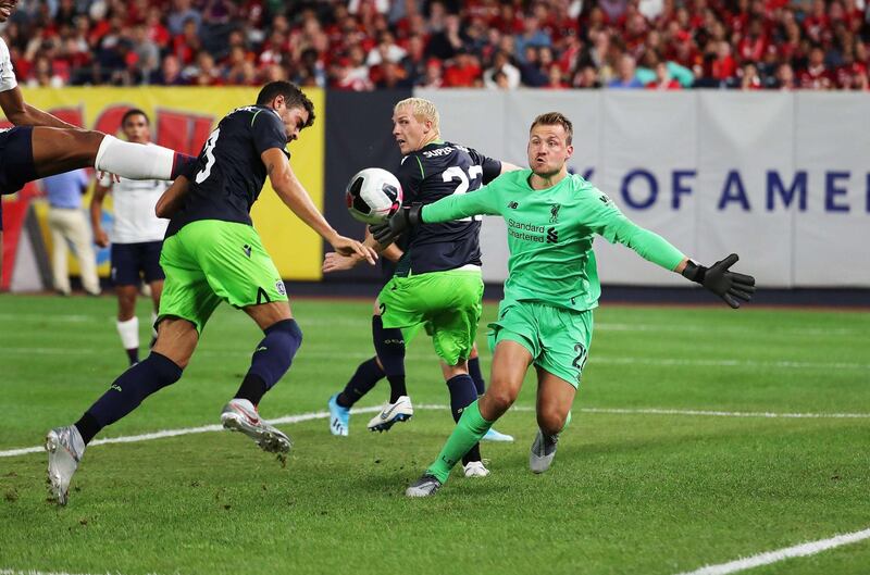 Liverpool goalkeeper Simon Mignolet makes a save. AFP