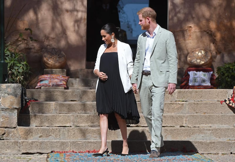 Prince Harry and Meghan, Duchess of Sussex, in Loyd/Ford and Babaton, visit the Kasbah of the Udayas near Rabat on February 25, 2019. AFP