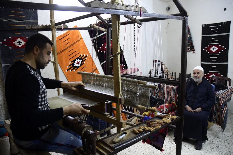 Khosayyem trains his nephew at his workshop.