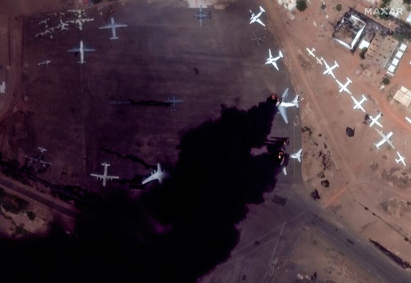 Burning planes at Khartoum International Airport. EPA