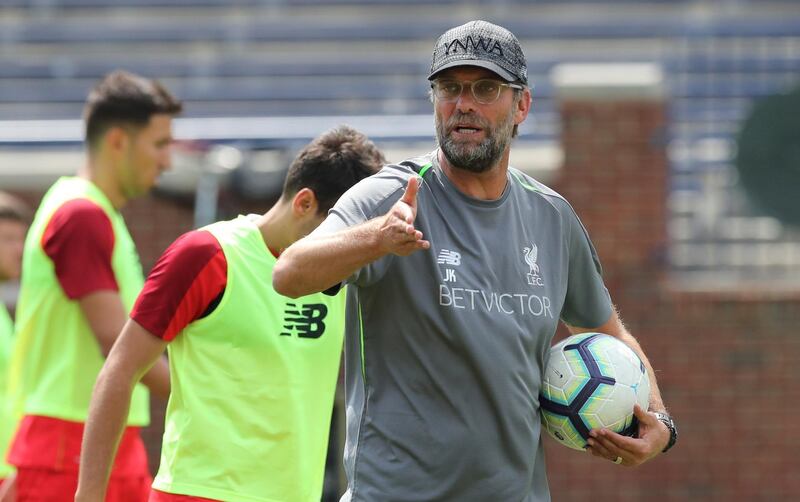Liverpool manager Jurgen Klopp instructs his team during a training session, Friday, July 27, 2018, in Ann Arbor, Mich. Liverpool FC will play Manchester United on Saturday in an International Champions Cup tournament soccer match. (AP Photo/Carlos Osorio)
