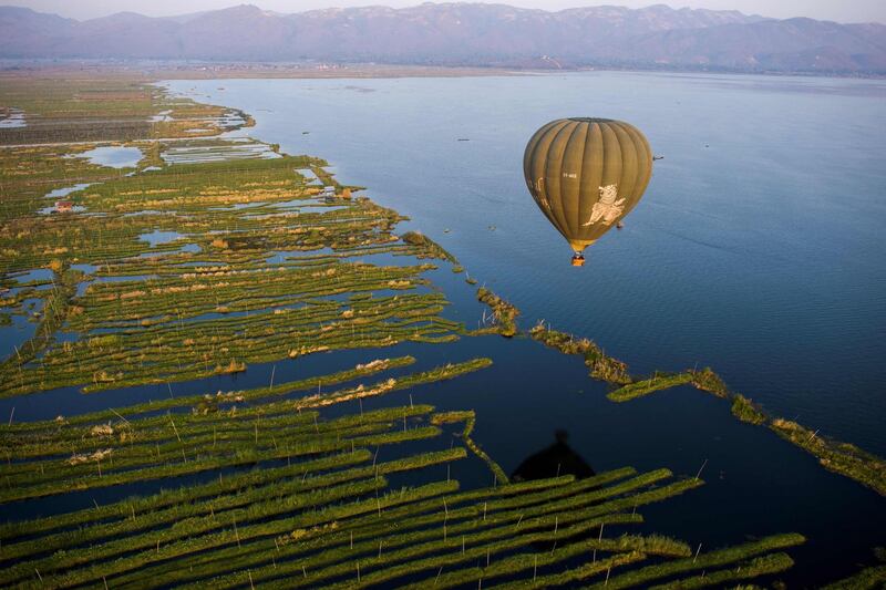 A hot air balloon flying over Inle lake in Shan State, Myanmar. AFP
