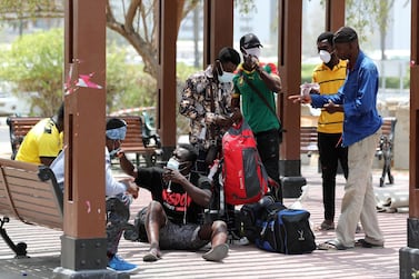 The homeless and jobless people from Ghana gather at a park in Dubai's Satwa district. Chris Whiteoak / The National
