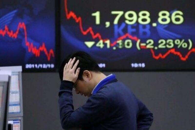 The Korea Composite Stock Price Index in Seoul dropped on the news of Kim Jong-il's death yesterday. Lee Jin-man / AP Photo