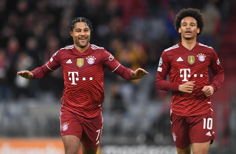 Serge Gnabry celebrates scoring their second goal with Leroy Sane. Reuters