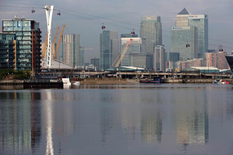 The Emirates Air Line cable car passing London's financial district, Canary Wharf.  Justin Tallis / AFP