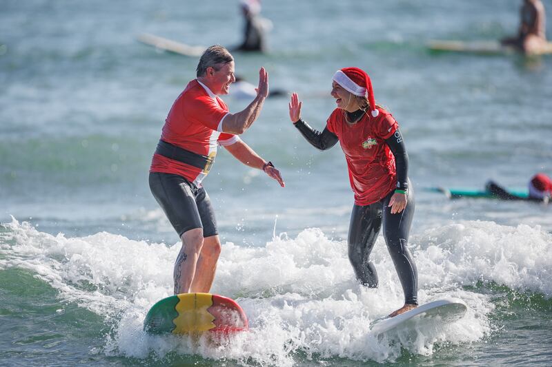 Santas were not deterred by the cold temperatures. Reuters