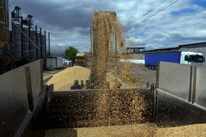 A truck is loaded with grain in Odesa as Russia's attack on Ukraine continues. Reuters