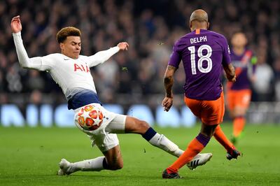 LONDON, ENGLAND - APRIL 09: Dele Alli of Tottenham Hotspur tackles Fabian Delph of Manchester City during the UEFA Champions League Quarter Final first leg match between Tottenham Hotspur and Manchester City at Tottenham Hotspur Stadium on April 09, 2019 in London, England. (Photo by Justin Setterfield/Getty Images)