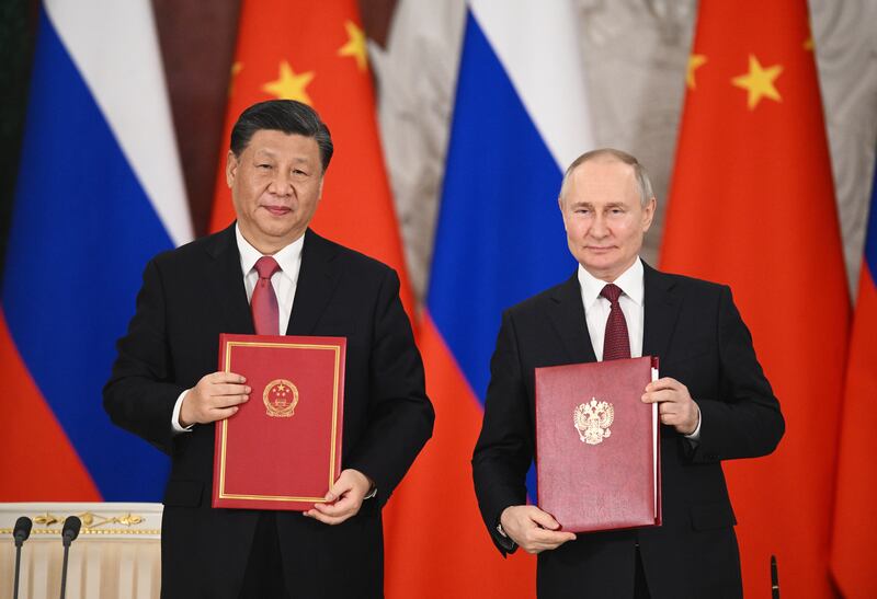 Russian President Vladimir Putin meets China's President Xi Jinping at the Kremlin in Moscow. EPA