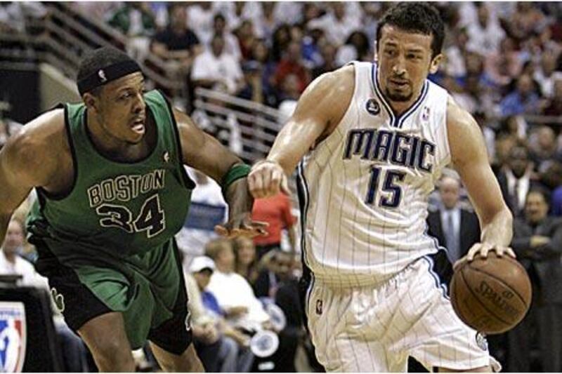 The Orlando Magic forward Hedo Turkoglu drives around the Boston Celtics forward Paul Pierce during the second half of the third match of the best-of-seven Eastern Conference semi-final series.
