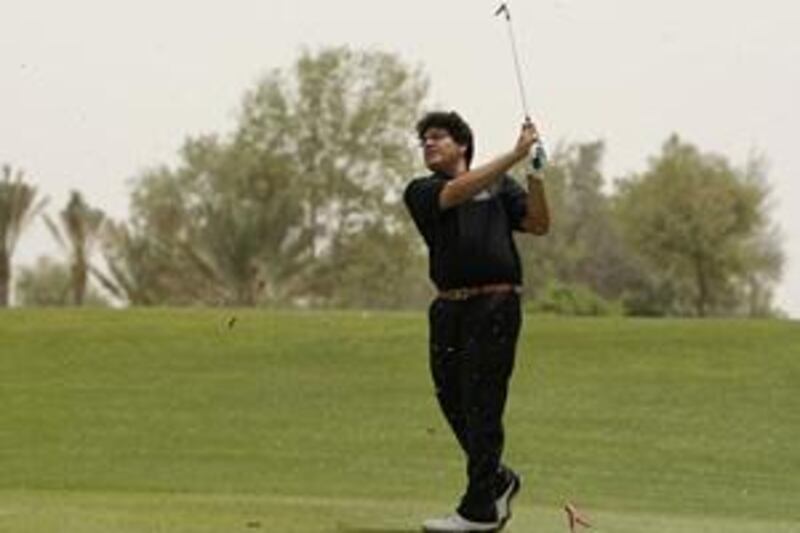 Khalid Yousuf, shown practising with the UAE team at Abu Dhabi Golf Club last month, says he has no plans to turn professional.