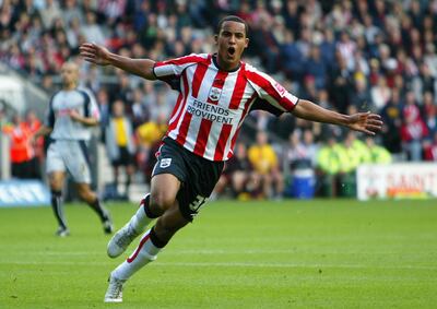 SOUTHAMPTON, UNITED KINGDOM - OCTOBER 29: Theo Walcott of Southampton celebrates scoring a goal during the Coca-Cola Championship match between Southampton and Stoke City at St Mary's Stadium on October 29, 2005 in Southampton, England.   (Photo by Julian Finney/Getty Images)
