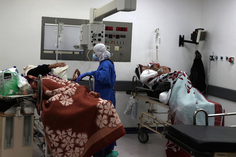 A medical worker takes care of Covid-19 patients in the intensive care unit of the Rafik Hariri University Hospital in Beirut, Lebanon. AP