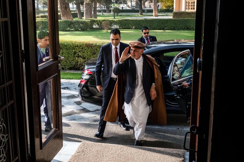 Ashraf Ghani, Afganistan's president, center, arrives at the Presidential Palace in Kabul, Afghanistan, on Thursday, Nov. 1, 2018. Ghani said the Taliban must embrace direct talks with the nation's government to help end the 17-year war that's maimed and killed tens of thousands of people and cost the U.S. more than $900 billion. Photographer: Jim Huylebroek/Bloomberg