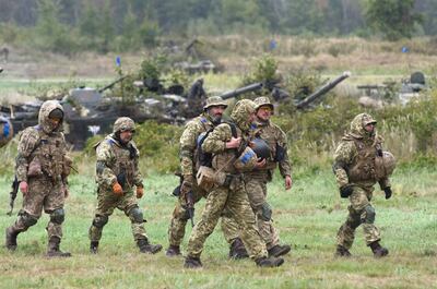 Ukrainian servicemen take part in the joint Rapid Trident military exercises with the US and other Nato countries nor far from Lviv in September. AFP