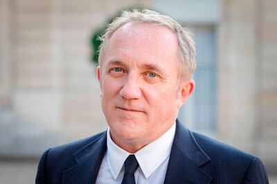 French CEO of Kering, Francois-Henri Pinault speaks at the Elysee presidential palace in Paris on August 23, 2019, after taking part in a meeting of the G7 Advisory Council for Equality between Women and Men with French President and civil society representatives as part of the 'Day of Dialogue'. / AFP / GEOFFROY VAN DER HASSELT
