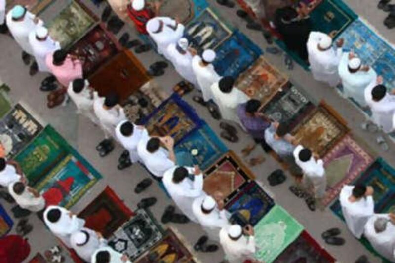 Prayers at the Late Mohammed Oharib Mansoori Mosque in the Al Mussala area of Abu Dhabi.