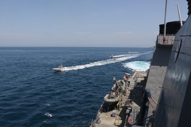 This US Navy photo obtained April 22, 2020 shows Iranian Islamic Revolutionary Guard Corps Navy (IRGCN) vessels conducting unsafe and unprofessional actions against the guided-missile destroyer USS Paul Hamilton (DDG 60) and other US military ships by crossing the ships’ bows and sterns at close range while operating in international waters of the north Gulf on April 15, 2020.  Paul Hamilton is conducting joint interoperability operations in support of maritime security in the US 5th Fleet area of operations. US President Donald Trump said April 22, 2020 he had ordered the US military to attack and destroy any Iranian vessel that harasses US Navy ships.
"I have instructed the United States Navy to shoot down and destroy any and all Iranian gunboats if they harass our ships at sea," Trump said on Twitter.
 - RESTRICTED TO EDITORIAL USE - MANDATORY CREDIT "AFP PHOTO /US NAVY/HANDOUT " - NO MARKETING - NO ADVERTISING CAMPAIGNS - DISTRIBUTED AS A SERVICE TO CLIENTS
 / AFP / Navy Office of Information / Handout / RESTRICTED TO EDITORIAL USE - MANDATORY CREDIT "AFP PHOTO /US NAVY/HANDOUT " - NO MARKETING - NO ADVERTISING CAMPAIGNS - DISTRIBUTED AS A SERVICE TO CLIENTS
