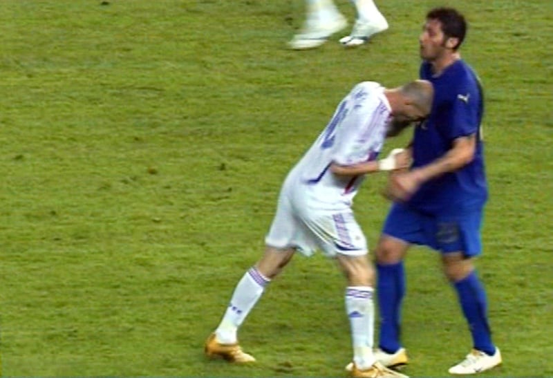 This TV grab taken 09 July 2006 on French TV channel LCI shows France's football team captain Zinedine Zidane (L) butting Italian defender Marco Materazzi during the World Cup 2006 final football match between Italy and France at Berlin’s Olympic Stadium. Italy won 5-3 on penalties after the final had finished tied 1-1 after extra-time.    AFP PHOTO / LCI / AFP PHOTO / LCI / DESK