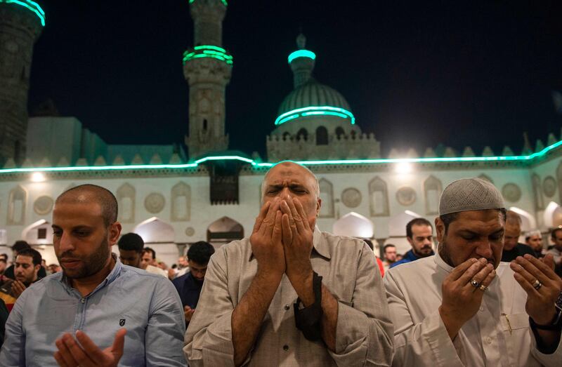 Muslim worshippers pray on Laylat Al Qadr during Ramadan in April in 2022 at the Al Azhar Mosque in Cairo. AFP