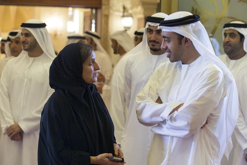 Sheikh Abdullah bin Zayed, Minister of Foreign Affairs, right, speaks with Sheikha Lubna Al Qasimi, Minister of Development and International Co-operation, during the iftar reception at Al Mushrif Palace. Donald Weber / Crown Prince Court - Abu Dhabi