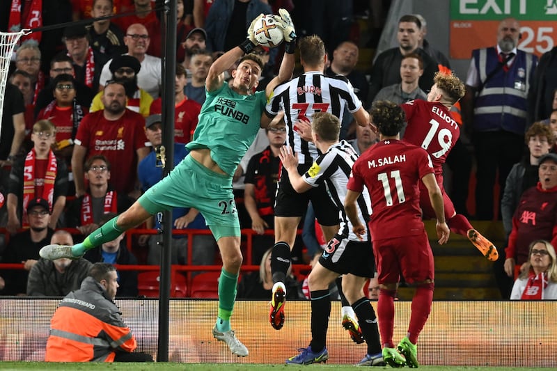 Newcastle goalkeeper Nick Pope takes a catch. AFP