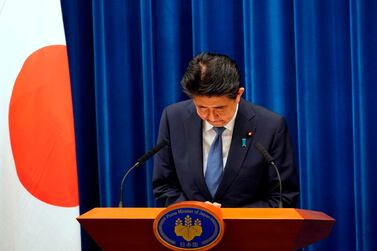 Shinzo Abe bows after stepping down as Japan's Prime Minister in Tokyo. Reuters