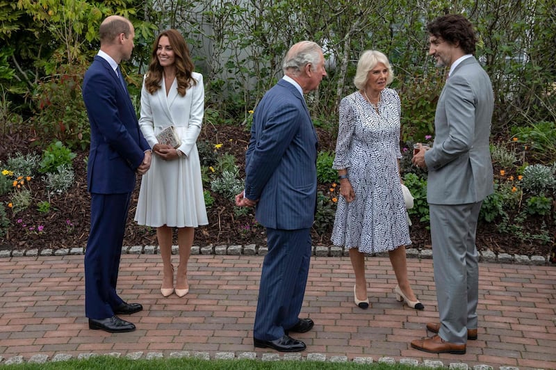 (L-R) Britain's Prince William, Duke of Cambridge, Britain's Catherine, Duchess of Cambridge, Britain's Prince Charles, Prince of Wales, Britain's Camilla, Duchess of Cornwall and Canada's Prime Minister Justin Trudeau attend a reception with G7 leaders at The Eden Project in south west England on June 11, 2021. G7 leaders from Canada, France, Germany, Italy, Japan, the UK and the United States meet this weekend for the first time in nearly two years, for three-day talks in Carbis Bay, Cornwall. / AFP / POOL / Jack Hill
