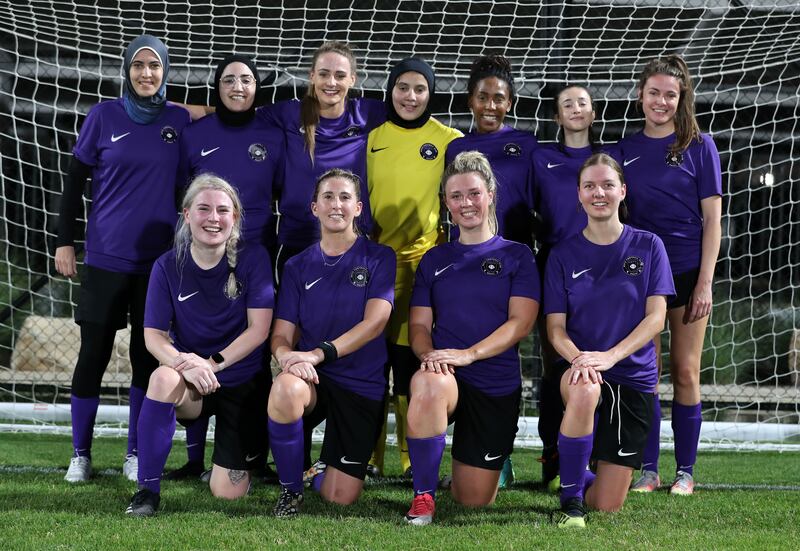 The Onyx football team poses ahead of their match in Dubai for International Women's Day.