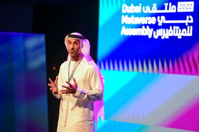 Khalfan Belhoul, chief executive of the Dubai Future Foundation, speaks at the Dubai Metaverse Assembly on Wednesday. Khushnum Bhandari / The National