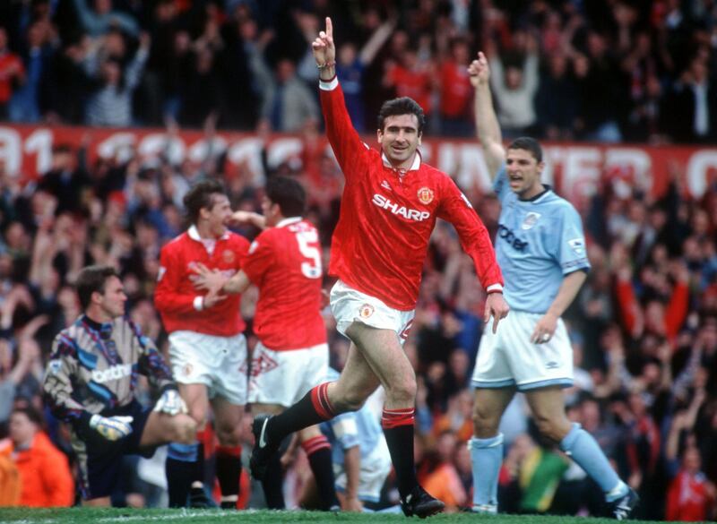 23 APR 1994:  A PICTURE SHOWING ERIC CANTONA OF MANCHESTER UNITED FOOTBALL CLUB AS HE RUNS OFF WITH HIS ARM RAISED IN CELEBRATION AFTER SCORING THE FIRST GOAL IN HIS FIRST GAME AFTER HIS SUSPENSION AGAINST MANCESTER CITY IN THEIR PREMIER LEAGUE MATCH Mandatory Credit: Anton Want/ALLSPORT/Getty Images