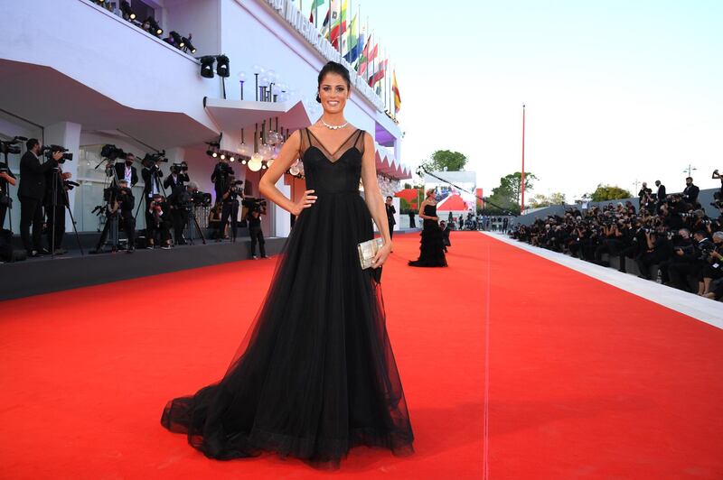 Daniela Ferolla in a dress by Elisa Leclé on the red carpet at the 77th Venice Film Festival. Getty Images